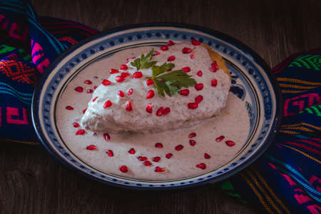 Chile en Nogada on a talavera plate from Puebla, traditional cuisine of Mexicoの写真素材