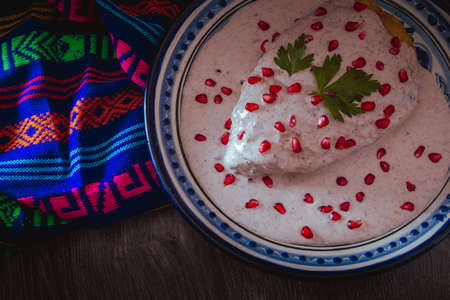 Chile en Nogada on a talavera plate from Puebla, traditional cuisine of Mexicoの写真素材