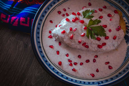 Chile en Nogada on a talavera plate from Puebla, traditional cuisine of Mexicoの写真素材