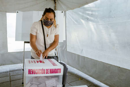 Citizens go to the polls to vote in the Citizen Consultation for the Removal of the Mandate of the...