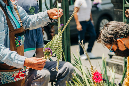 Artisans sell palm figures during the Palm Sunday celebration outside the Puebla Cathedral