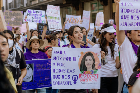Protests in the streets of the city of Puebla during the march for women's rights, feminist march against gender violence, March 8 in the City of Pueblaのeditorial素材
