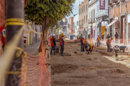 Construction workers on the streets of Pueblaのeditorial素材