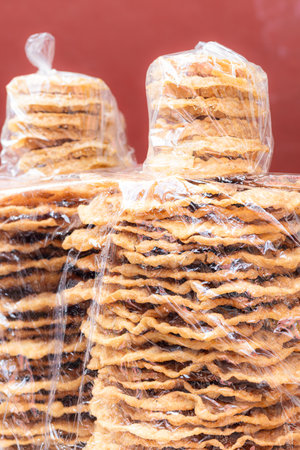 Traditional mexican fritter in plastic bag for saleの写真素材