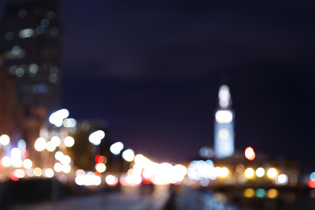 Bokeh and blur of San Francisco skyline at nightの写真素材