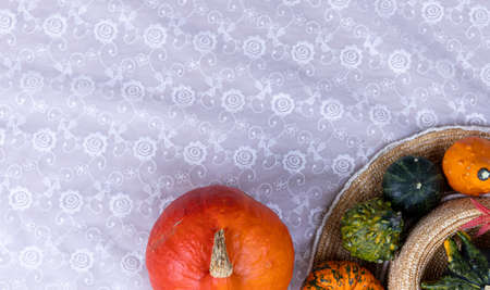 Pumpkin decorative and straw hat to celebrate Halloween and Thanksgiving. Harvest and fall conceptの写真素材