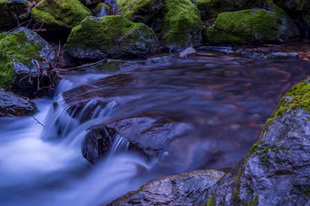 Water flowing over rocks. Beauty in nature. Long exposure. Lausanne, Switzerland. Tranquil scene.