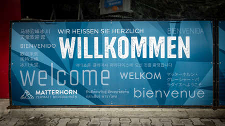 Matterhorn, Valais Canton, Switzerland - 24.09.21.2021: Welcome to Matterhorn panel sign. Welcome messages in many different written languages. Sign.のeditorial素材
