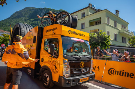 Aigle, Valais Canton, Switzerland -10.07.2022: Passage of an advertising car of Continental in the caravan of the Tour de France in Switzerland.のeditorial素材