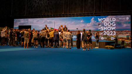 Geneva, Geneva Canton, Switzerland - 27 August, 2023: Handler presenting dog during World dog show.のeditorial素材