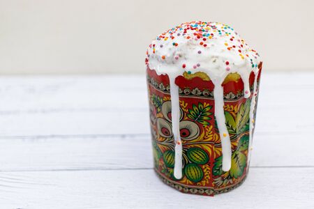 Easter Cake with dripping icing on white background. Russian and Ukrainian Traditional Kulich, Easter Bread.の写真素材