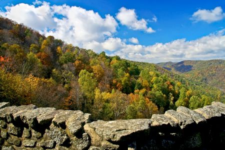 Beautiful autumn view from top of mountain of the peak of the fall leaf change over.