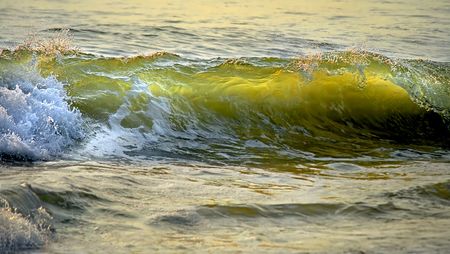 Beautiful and colorful wave in the middle of crashing.の写真素材