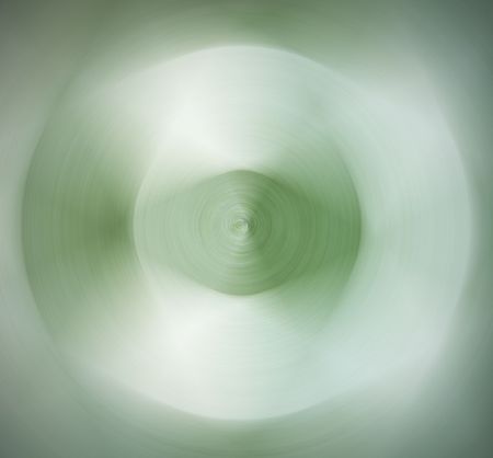 Green abstract background with a circular blurred effect.の写真素材
