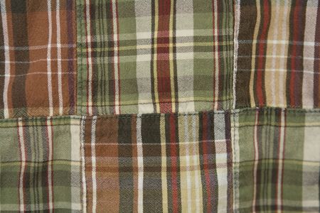 Textured background of multi colored fabric material.