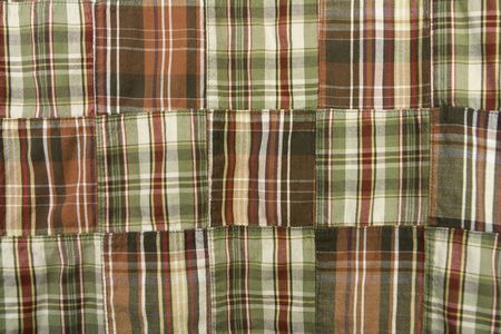 Textured background of multi colored fabric material.