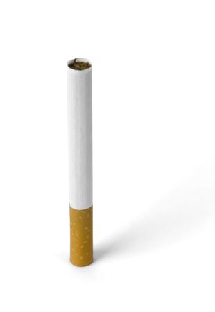Isolated cigarette over a white colored background.の写真素材