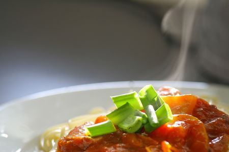 Plate of spaghetti with tomato sauce.の写真素材