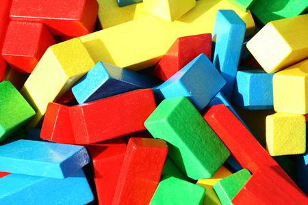 Colorful toy blocks in red, blue, yellow and green.