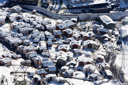 Winter scene with chalets or winter cabin homes.の写真素材