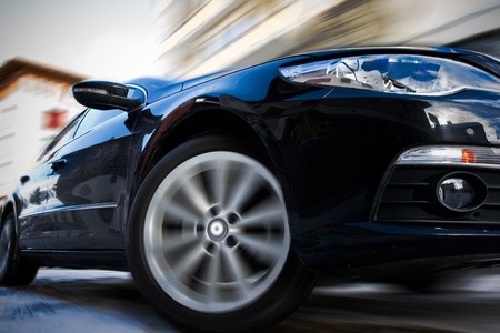 Fast moving car with motion blurの写真素材