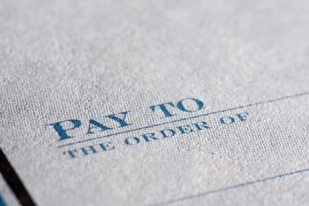 Close up of a cheque book focus on Pay Toの写真素材