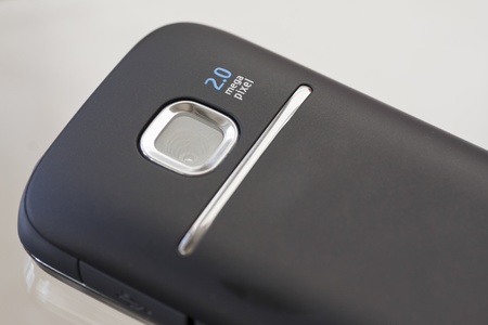 Close up of the back of a mobile phone showing the digital camera