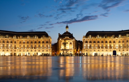 Place de la Bourse in the city of Bordeaux, France with reflection from water fountain Place de la Bourse in the city of Bordeaux, France with reflection from water fountain