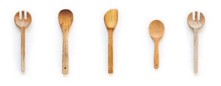 Isolated wooden kitchen spoons and ladles on white backgroundの写真素材