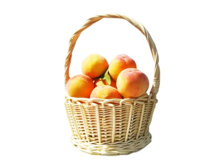 fruits peaches in the wicker-work pottle の写真素材