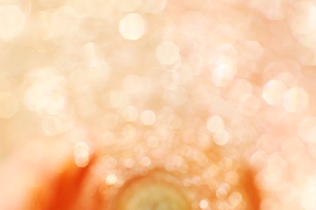 Abstract blurred background in yelloworange tone and bokeh.の写真素材