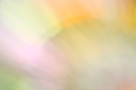 Abstract blur pastel light mix color stains bokeh backgroundの写真素材
