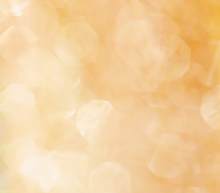 Abstract blur bright golden bokeh backgroundの写真素材