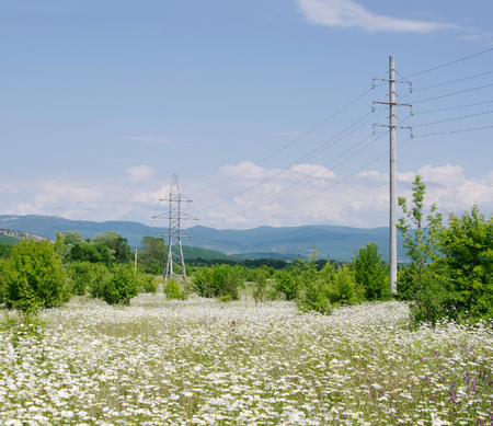 Power lines in spring  blooming  Bajdarsky valley, Crimeaの写真素材