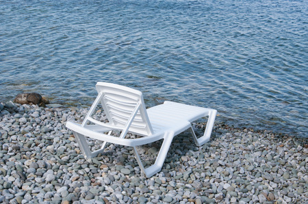 free beach sunbed on sea shoreの写真素材