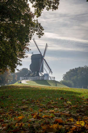 old wind mill in brugge in belgiumの写真素材