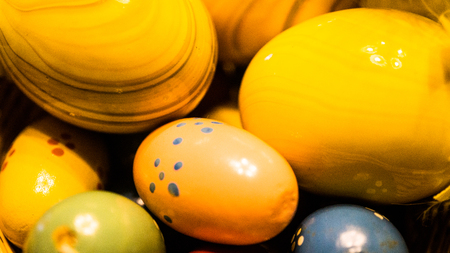 yellow wooden easter eggsの写真素材