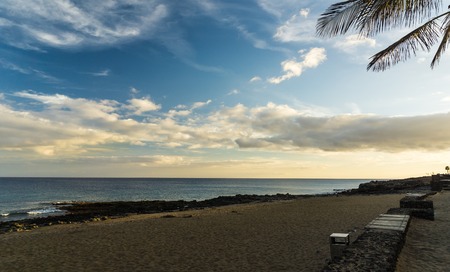 rocky beach at sunsetの写真素材