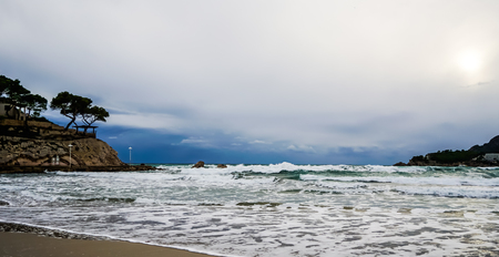 dark clouded coastlineの写真素材