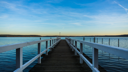 footbridge at lake Plauer See idyllic landscapeの写真素材