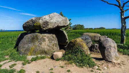 ancient stone gravesite on a field near Rerik, germanyの写真素材