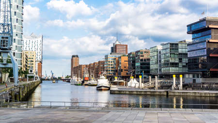 HAMBURG, GERMANY - June 23, 2019 historical ships in port Sandtorhafen of Hamburg port district HafenCity and philharmonic hall Elbphilarmonieのeditorial素材