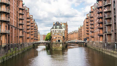 HAMBURG, GERMANY - June 23, 2019 UNESCO world heritage warehouse district Speicherstadt in Hamburg with popular water castleのeditorial素材