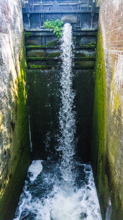 water flowing over an old dam in Bobzin in Mecklenburg-Western Pomerania