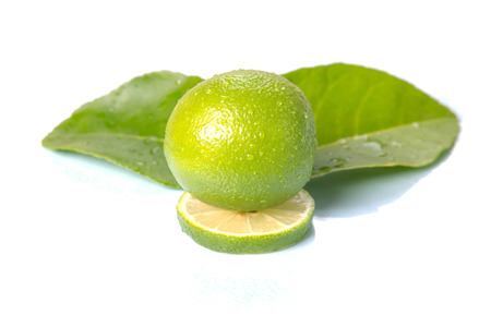 Lemon green leaf water drop isolated on white background with clipping pathの写真素材