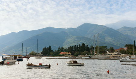 Montenegro, Bay of Kotor near Tivat city. View of Seljanovo village from the sea.の写真素材