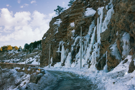 Dangerous stretch of road in the winter. Montenegroの写真素材