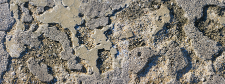 Random patterns of the old road surfaceの写真素材