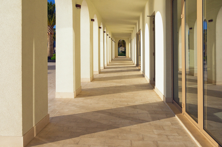 View of the arches of the building in the setting sun.
Embankment of Tivat city, Montenegroの写真素材