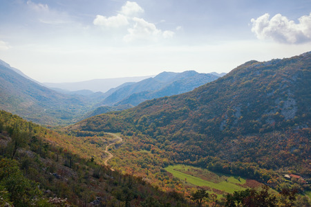Beautiful mountain landscape with a small village and a path.  Bosnia and Herzegovina, Republika Srpskaの写真素材